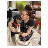 Laura Kearns, trustee of Lucas Helps Dogs, with one of the rescued animals. Picture supplied.