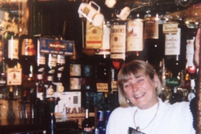Linda Harrison behind the bar.