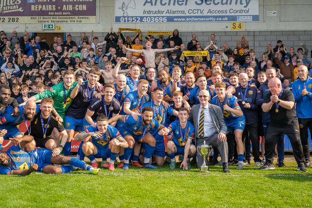Leamington FC players, coaches, staff, fans and Chairman Jim Scott celebrate their playoff final victory.