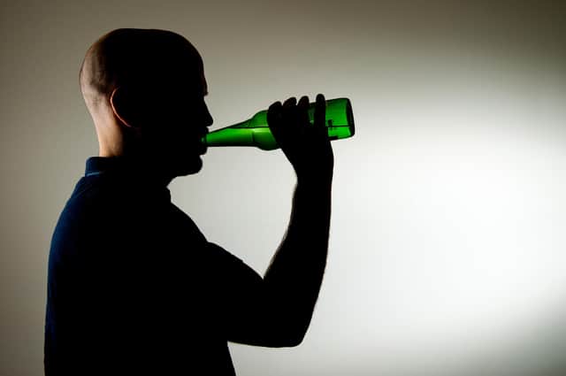EMBARGOED TO 0001 TUESDAY NOVEMBER 30 PICTURE POSED BY MODEL File photo dated 09/03/15 of a man drinking alcohol. Alcohol advertising needs tighter restrictions to limit the "constant bombardment" at celebrations such as Christmas and sports events, MPs and health experts have warned. Issue date: Tuesday November 30, 2021.