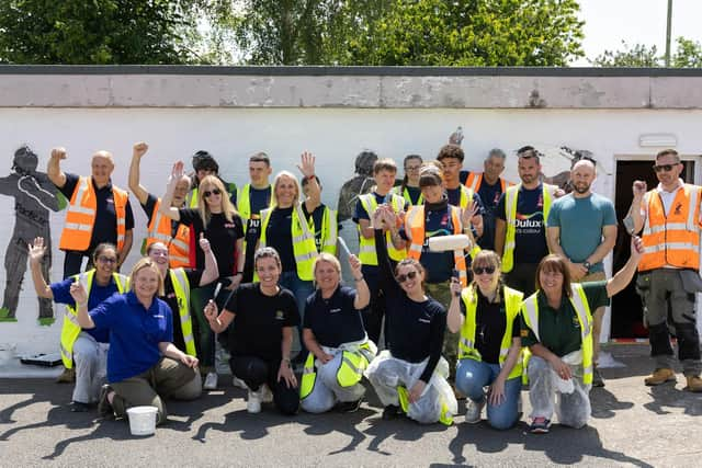 Volunteers brighten the Bradby Club.