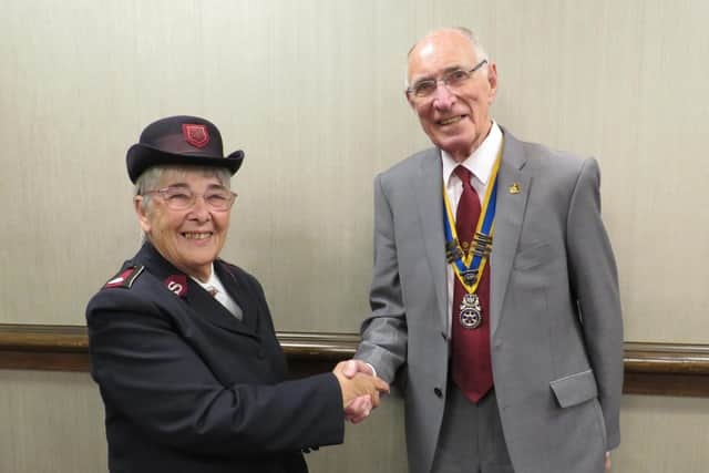 Lieutenant-Colonel Brenda Oakley with Warwick Rotary President Keith Talbot. Photo supplied