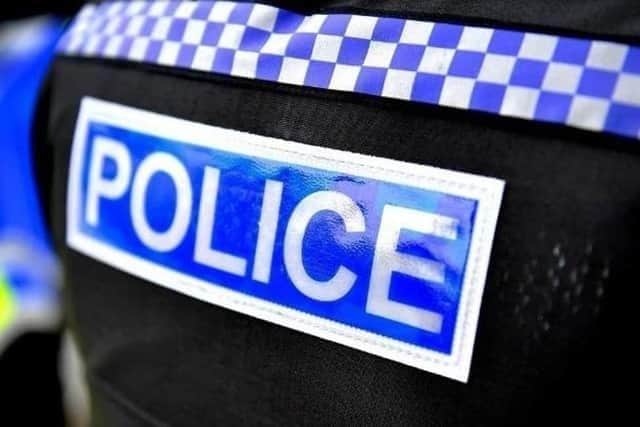 A man has been arrested after reports of someone trying car doors in Priory Road, Warwick.