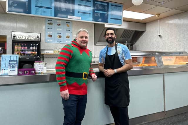 Cllr Jody Tracey and Arun Singh Matoo, the new owner of the Spinney Hill Fish Bar in Warwick. Photo supplied