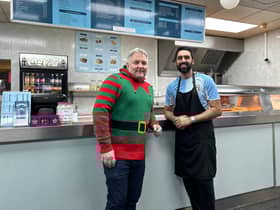 Cllr Jody Tracey and Arun Singh Matoo, the new owner of the Spinney Hill Fish Bar in Warwick. Photo supplied