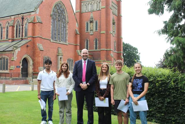A-level pupils with Headmaster, Grove du Toit at Princethorpe College this morning left to right: Pratheesh Prabakaran, Erin Arriordaz, Mr du Toit, Laurel Arkesden, Oscar Page, Eleanor Page. Photo supplied by Princethorpe College