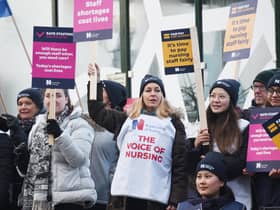 Nurses braving freezing temperatures to form a picket line.