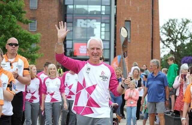 Les Barnett  carries the baton on the Stratford leg of the Queen's Baton Relay for the Birmingham  2022 Commonwealth Games. Picture supplied.