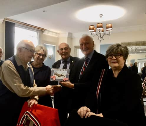 Rusty with RAFA chairman Stuart Powney and Treasurer Patrick Fitzgerald and his daughters Alison and Kathryn Rusty with daughters Alison and Kathryn Rusty and his cake. Picture supplied.