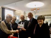 Rusty with RAFA chairman Stuart Powney and Treasurer Patrick Fitzgerald and his daughters Alison and Kathryn Rusty with daughters Alison and Kathryn Rusty and his cake. Picture supplied.