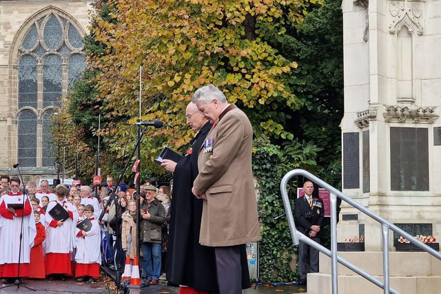 Members of the community gathered in Church Street for the wreath laying at the war memorial. Photo by Warwick Court Leet