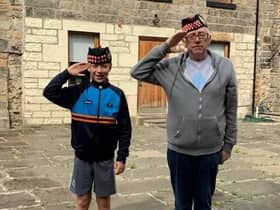 Dave Kelly's father showing his son his old stomping ground