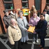 Centre, Dr Meena Paul hands over the defibrillator to the group. Right, Jonny Weston of JAW Maintenance.