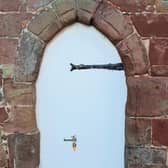 A 14th century wooden door at historic Peter Hall had a hole cut into it so a garden tap could be installed.