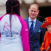 Kadeena Cox receiving the Baton from The Queen at the Queen's Baton Relay launch.