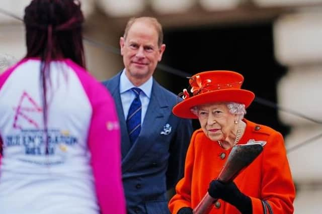 Kadeena Cox receiving the Baton from The Queen at the Queen's Baton Relay launch.