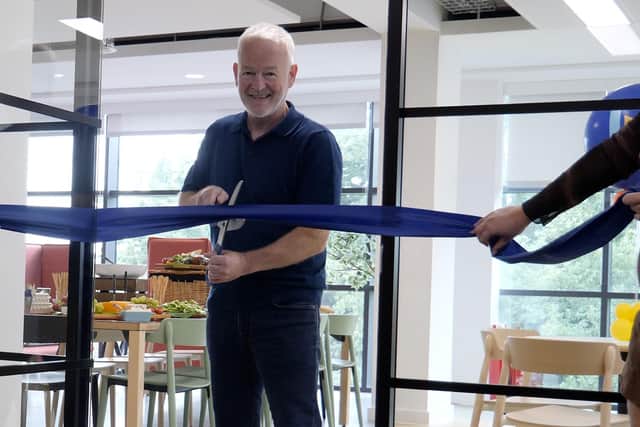Stephen Murdoch, Executive Chair of Bright, cut’s the ribbon on the company's new office in Leamington. Picture supplied.