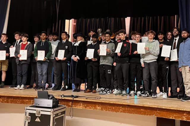 Students receive their Duke of Edinburgh awards.