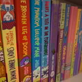 A baffled councillor railed against Warwickshire County Council for approving library cuts the day after it promoted National Storytelling Week.