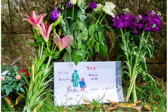 One of the many tributes laid next to St Nicholas Church in Kenilworth. Photo by Mike Baker