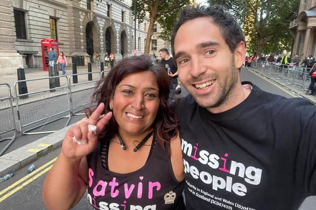 Satvir Sembhi running the London Marathon with Dave Warne, the fundraising event coordinator for Missing People.