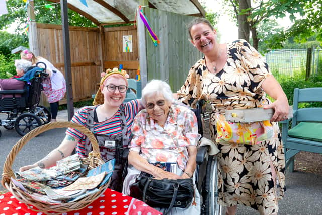 Resident Yvonne, team member Emily and Emma from Baylis Bees enjoy summer festival at Priors House.
Picture by Shaun Fellows / Shine Pix Ltd