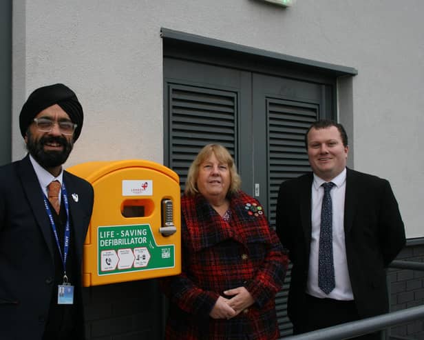 Whitnash Councillor and Campion School Governor, Judy Falp, visited the school to see the new defibrillator in situ along with Headteacher Jassa Panesar and Assistant Head Nick Hawkins. Picture supplied.