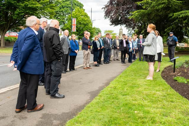 Sam Cooke (Mayor of Kenilworth), Jon Holmes (sculpture artist) and Sidney Syson (vice chair of Warwick District Council) conducted an unveiling of a new Covid sculpture to honour those who died in the pandemic, at Jubilee House.