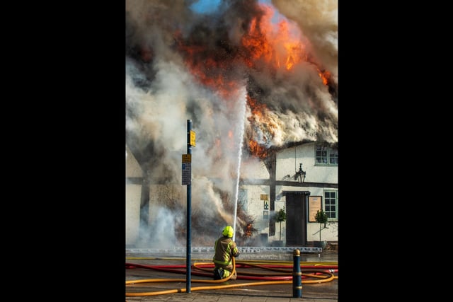 Firefighters tackle the blaze