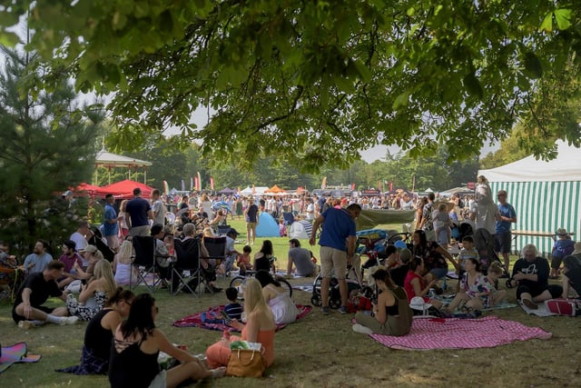 Visitors in the shade at The Leamington Food and Drink Festival 2023.