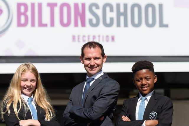 Headteacher and students at Bilton School