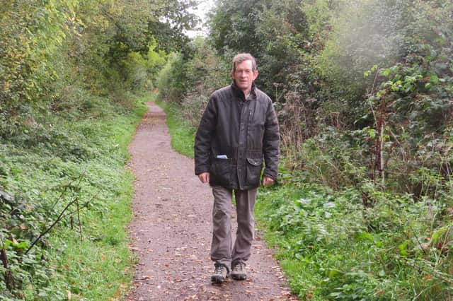 Richard Allanach is pictured on the Northampton Lane by-way at the point where the government is planning on splitting it in two with their new road.
