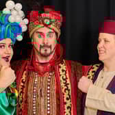 Widow Twankey played by Steve Bradnam, Abanazar played by Ashley Hirons and Aladdin played by Gemma Tilleys. Picture: Rob Warner.