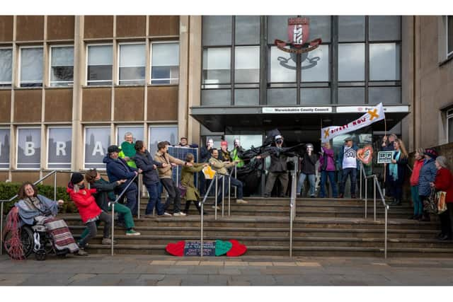 Supporters of Warwickshire Climate Alliance took part in the 'Divest from Crisis' Day of Action on March 24. Photo by Michelle Hardy