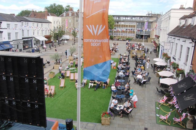 The site features a big screen showing the competitions taking place each day, as well as a seating area. There is also often accompanying activities. Photo by Geoff Ousbey