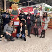 Store manager Rob Apted, Eli Whitlock, Jason Malin and Community Champion Alex Pearson with team members from the LWS Nightshelter. Photo supplied