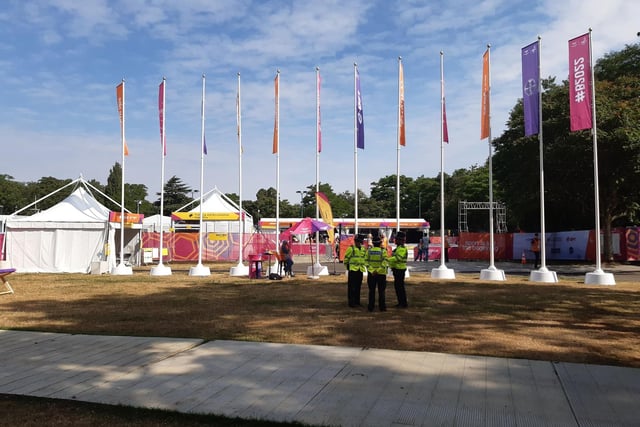 Birmingham 2022 Commonwealth Games flags being flown at the entrance to the bowls arena at Victoria Park in Leamington.