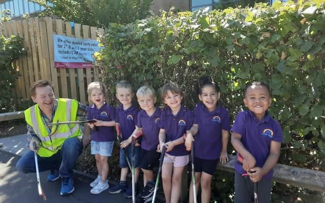Children from Coton Park Day Nursery on a litterpick adventure with Cllr Jim Ellis.