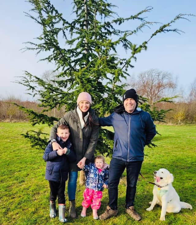 Sophie with her family.