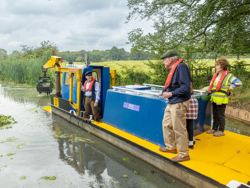 David Suchet pictured in September 2023 reopening a section of the Buckingham Canal on the dredger Diana, which he had formally launched and named in memory of Tim Coghlan’s late wife Diana, who died of cancer in 2014.