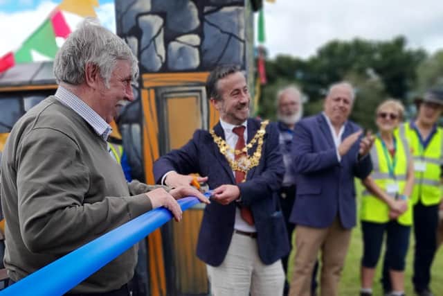 The Mayor of Warwick, Councillor Oliver Jacques, cutting the ribbon to open the festival. Photo by Sheila Thackwray