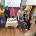 Standing from left to right: Maryna Windsor (EQuIP Volunteer Development Officer), Sheela Hammond (EQuIP Volunteer), Khukola Sherzad (EQuIP Volunteer), Saima Hussain (EQuIP Volunteer), Tetiana Vitvinova (EQuIP Volunteer). Sitting from left to right: Junaid Hussain (CEO of EQuIP); Abeda Vorajee (EQuIP Volunteer), Jo Goode (EQuIP Volunteer), Nikki Ajibade (EQuIP Volunteer).