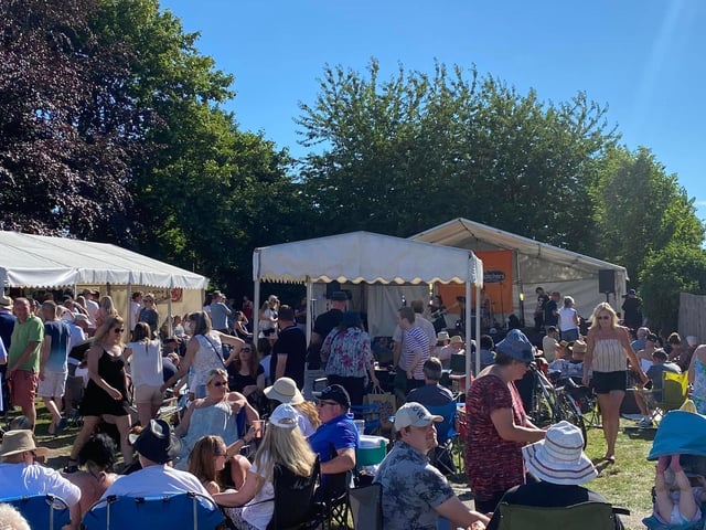 Crowds enjoy fun in the sun.