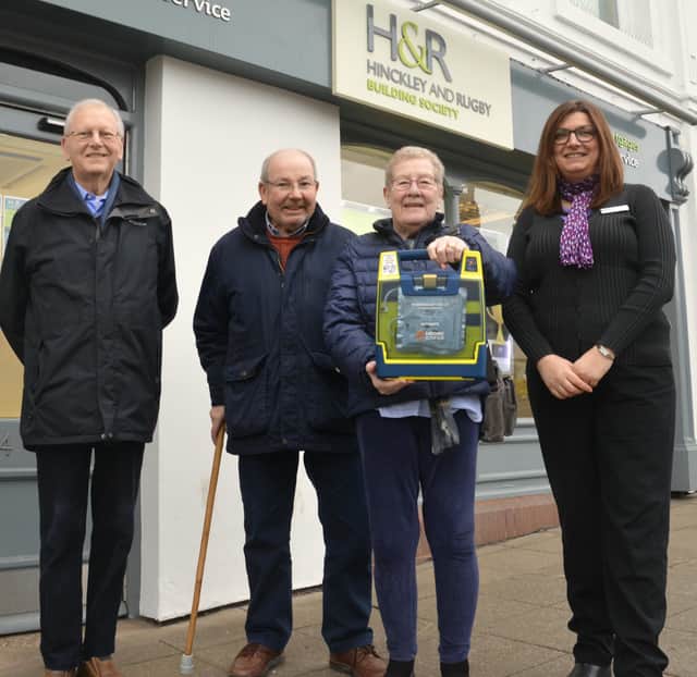 Chair Mike Perks, Mr Ian Staples and Mrs Sue Staples all from the Masharani Patient Group and Lutterworth assistant branch manager Jo Rogers.