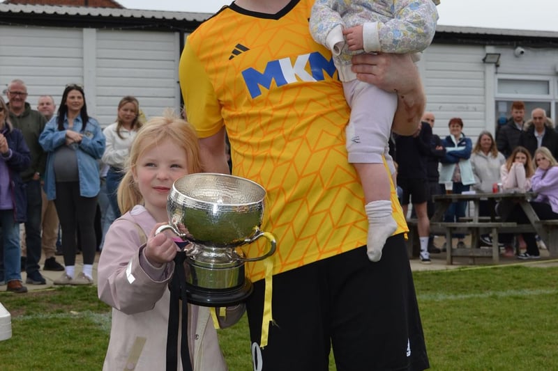 Bishops Itchington Captain Andy Yeates with daughters Freya (5) and Orlaith (1) and the Division 2 Cup