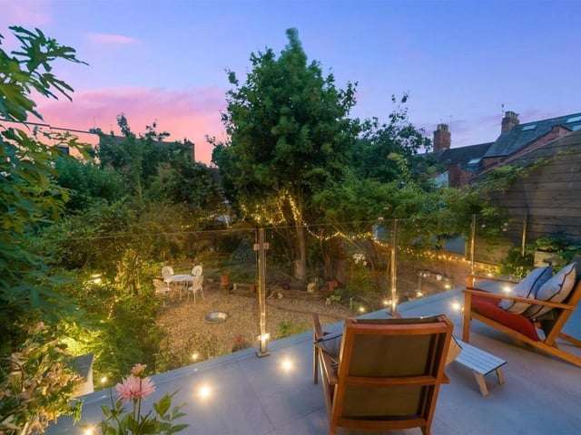 The sun terrace, which overlooks the garden. Photo by Fine and Country