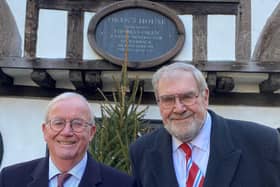 Clive Mason (left), chairman of the Charity of Thomas Oken and Nicholas Eyffler, and Terry Brown, a trustee and chairman of the Oken Feast committee, outside Thomas Oken’s former house in Castle Street, Warwick.. Photo supplied