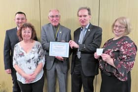 Warwick Rotary President Keith Talbot (centre) presents the Meritorious Award to Dr Librowski and his team: from left Dawid Kozlowski, Alex Willson, and far right Iza Topolinska. Photo supplied