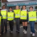 Pupils from Bilton C of E Junior School receiving their hi-vis kit bags from Barratt Homes.