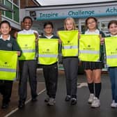 Pupils from Bilton C of E Junior School receiving their hi-vis kit bags from Barratt Homes.